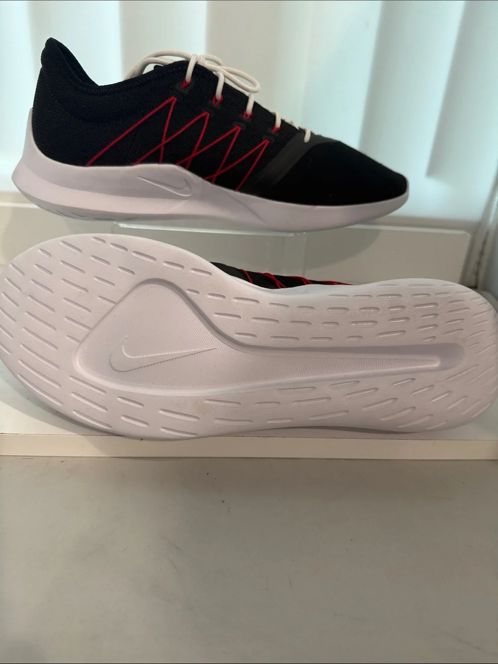 Nike Men's Black Athletic Shoes with Red Swoosh and White Sole
